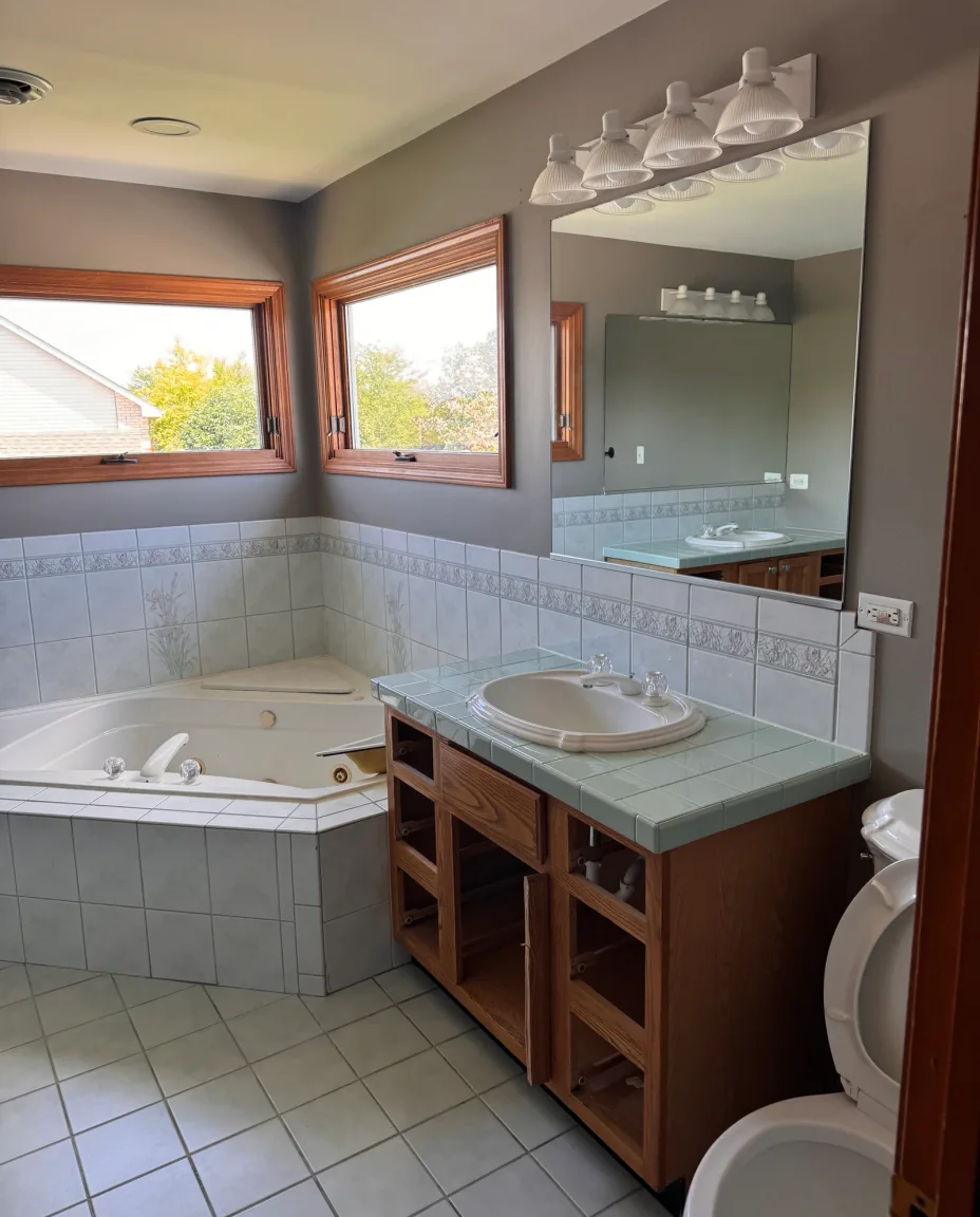 Bathroom remodel before: dated primary bath with an unused tub in a western suburbs home