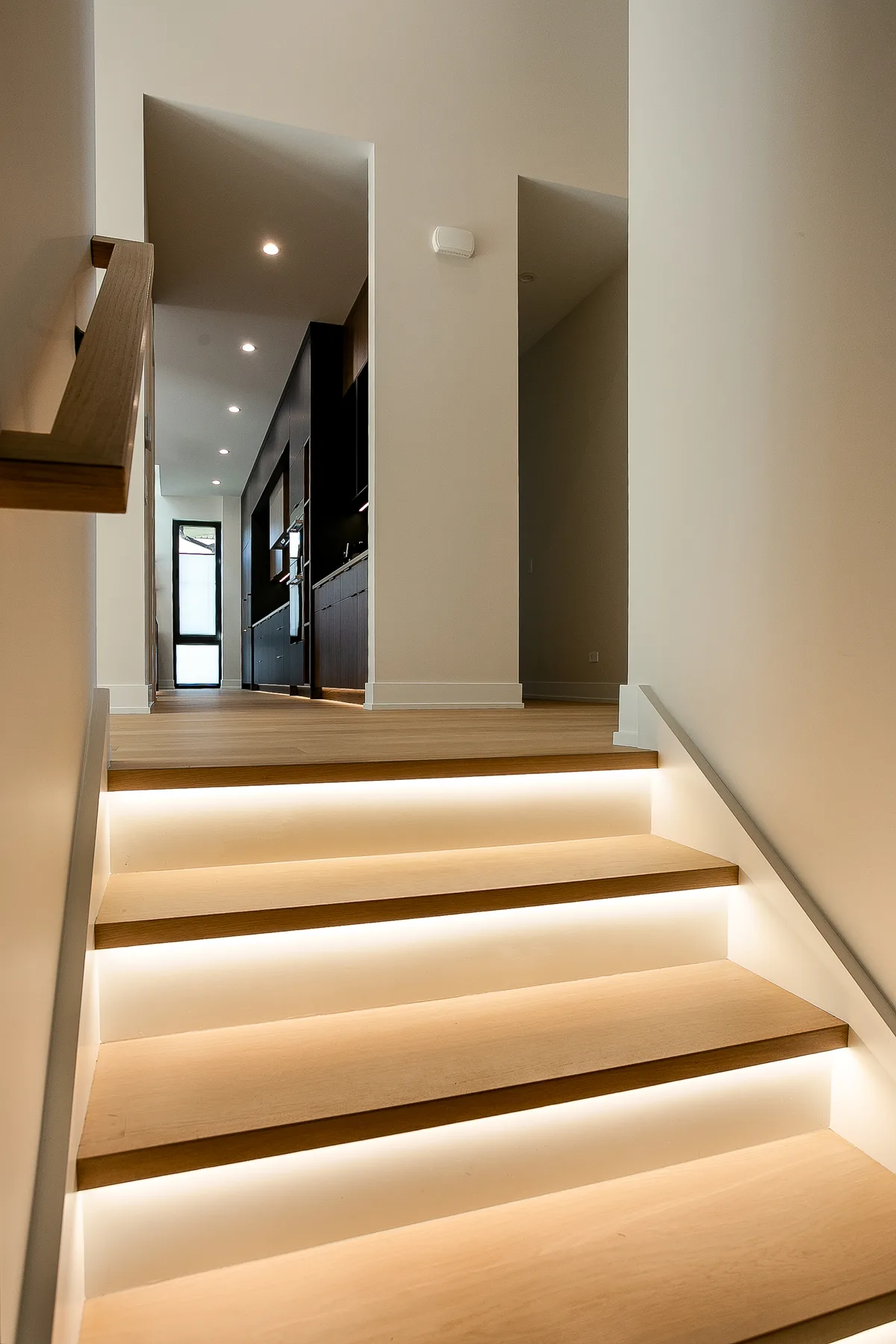 Oak staircase with LED-lit steps - custom home, Lemont IL